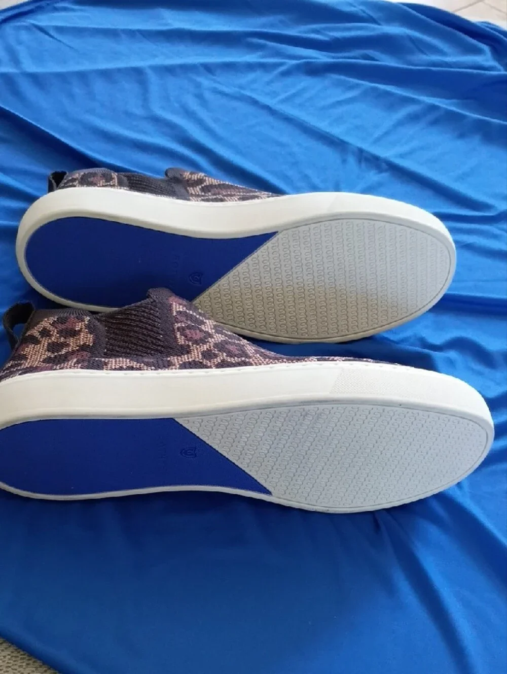 Rothy's The Chelsea Leopard Slip-On Knit Sneakers in Brown and Black